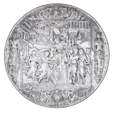 Lot 228 - **A STEEL TARGET WITH  EMBOSSED AND CHASED DECORATION