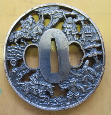 Lot 26 - A JAPANESE SILVER TSUBA, POSSIBLY EARLY EDO PERIOD