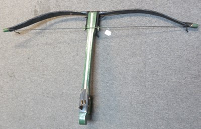 Lot 33 - A CROSSBOW IN THE CHINESE HAN DYNASTY STYLE OF 206-220 B.C., AND THREE FURTHER BOWS, 20TH CENTURY