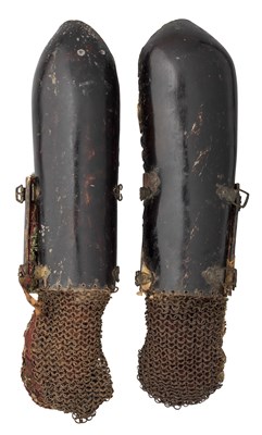 Lot 65 - â’¶ A PAIR OF INDIAN LAQUERED HIDE ARM DEFENCES (DASTANA), 18TH/EARLY 19TH CENTURY