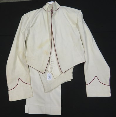 Lot 194 - AN ASSORTMENT OF TROPICAL WHITE DRILL UNIFORM AND OTHER CLOTHING, EARLY 20TH CENTURY