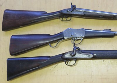 Lot 267 - A 20 BORE PERCUSSION SPORTING GUN, A D.B. PERCUSSION SPORTING GUN,  AND A MARTINI HENRY RIFLE