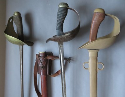 Lot 345 - â’¶ A 1908 PATTERN CAVALRY TROOPER'S SWORD, AND TWO 1912 PATTERN CAVALRY OFFICER'S SWORDS