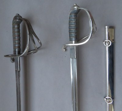 Lot 348 - â’¶ TWO ARTILLERY OFFICER'S SWORDS