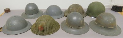 Lot 412 - â’¶ BRITISH WORLD WAR TWO STEEL HELMETS