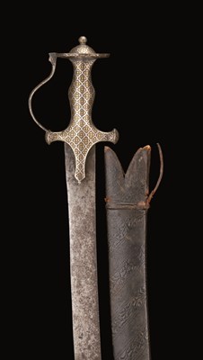 Lot 19 - AN INDIAN TALWAR WITH DECORATED HILT