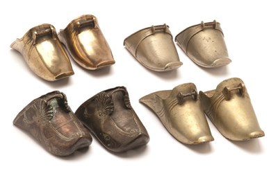 Lot 88 - FOUR PAIRS OF PERUVIAN BRASS AND WHITE METAL STIRRUPS