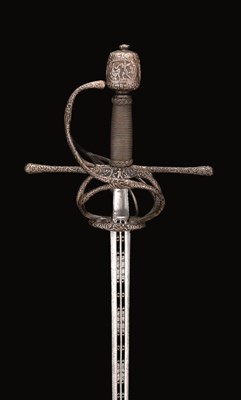 Lot 130 - A RARE GERMAN SWEPT-HILT RAPIER WITH CHISELLED STEEL HILT