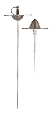 Lot 147 - A FINE AND VERY RARE GARNITURE OF A CUP-HILT RAPIER AND LEFT-HAND DAGGER