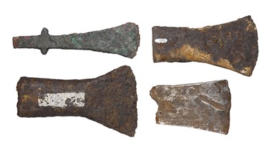 Lot 115 - **ONE BRONZE AND THREE IRON AXE HEADS