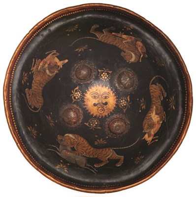 Lot 74 - A NORTH INDIAN PAINTED HIDE SHIELD