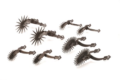 Lot 82 - FOUR PAIRS OF MEXICAN ROWEL SPURS