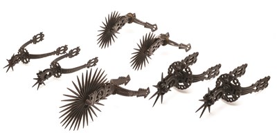 Lot 83 - A LARGE MEXICAN ROWEL SPUR AND THREE FURTHER PAIRS OF MEXICAN ROWEL SPURS