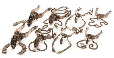 Lot 84 - FOUR PAIRS OF BRAZILIAN WHITE METAL ROWEL SPURS