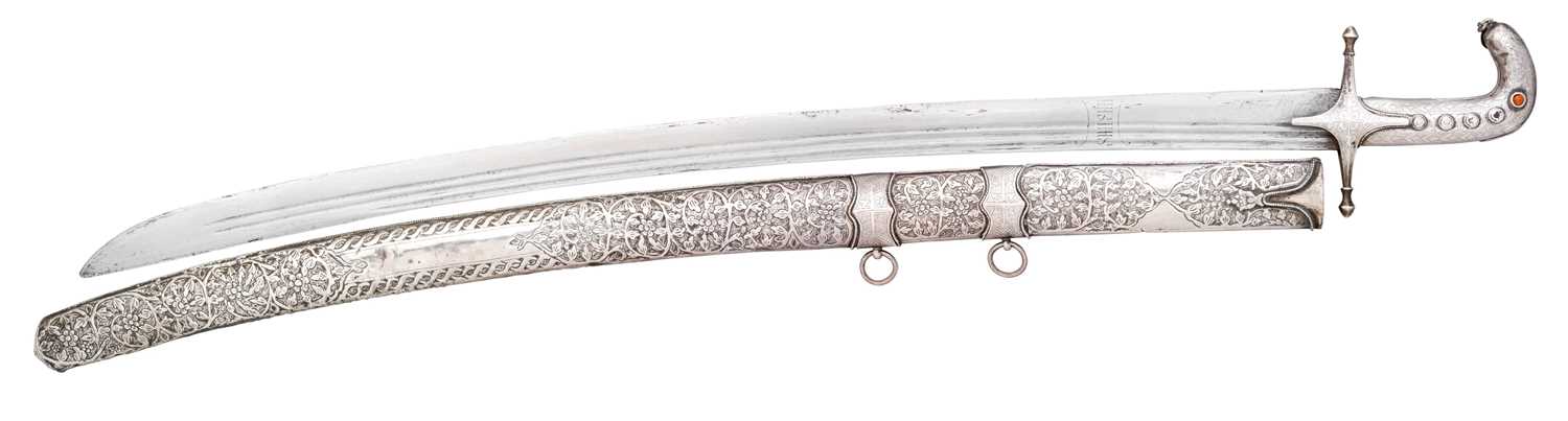 Lot 74 - AN ARAB SILVER-MOUNTED SHAMSHIR
