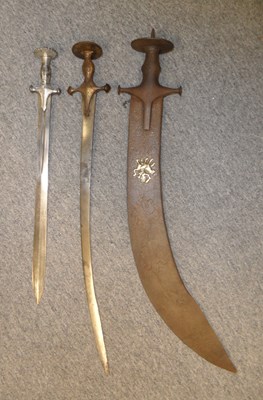 Lot 82 - AN INDIAN EXECUTIONER'S SWORD (TEGHA) AND TWO INDIAN SWORDS (TALWAR)