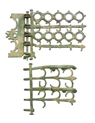 Lot 257 - â€¡ TWO FRAGMENTARY BRONZE HINGES