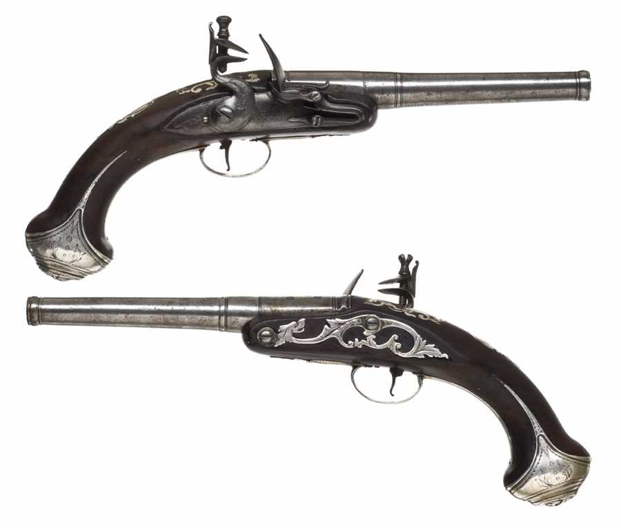 Lot 387 - *A PAIR OF SILVER MOUNTED FLINTLOCK TURN-OFF