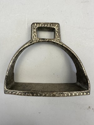 Lot 549 - A NORTH INDIAN COPPER ALLOY STIRRUP, LATE 19TH CENTURY, POSSIBLY RAJASTHAN