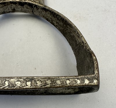 Lot 549 - A NORTH INDIAN COPPER ALLOY STIRRUP, LATE 19TH CENTURY, POSSIBLY RAJASTHAN