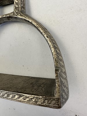 Lot 549 - A NORTH INDIAN COPPER ALLOY STIRRUP, LATE 19TH CENTURY, POSSIBLY RAJASTHAN