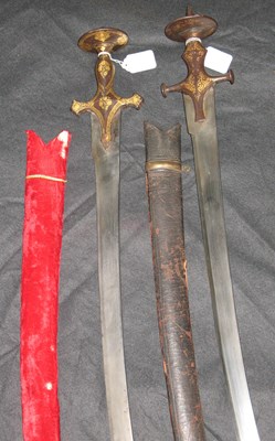 Lot 40 - TWO INDIAN SWORDS (TALWARS)