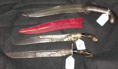 Lot 56 - TWO CEYLONESE DAGGERS (PIHA KAETTA) AND AN INDIAN DAGGER (KHANJAR)