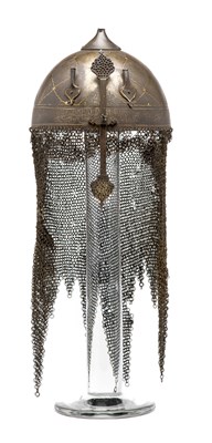 Lot 199 - A PERSIAN ETCHED IRON HELMET (KULAH KHUD)