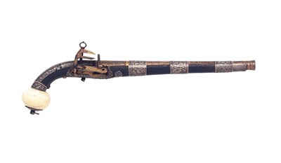 Lot 77 - a caucasian silver-mounted miquelet-lock pistol