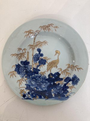 Lot 56 - A CHINESE BLUE AND GILT 'CRANE AND BAMBOO' PLATE, QING DYNASTY, YONGZHENG PERIOD (1723-35)
