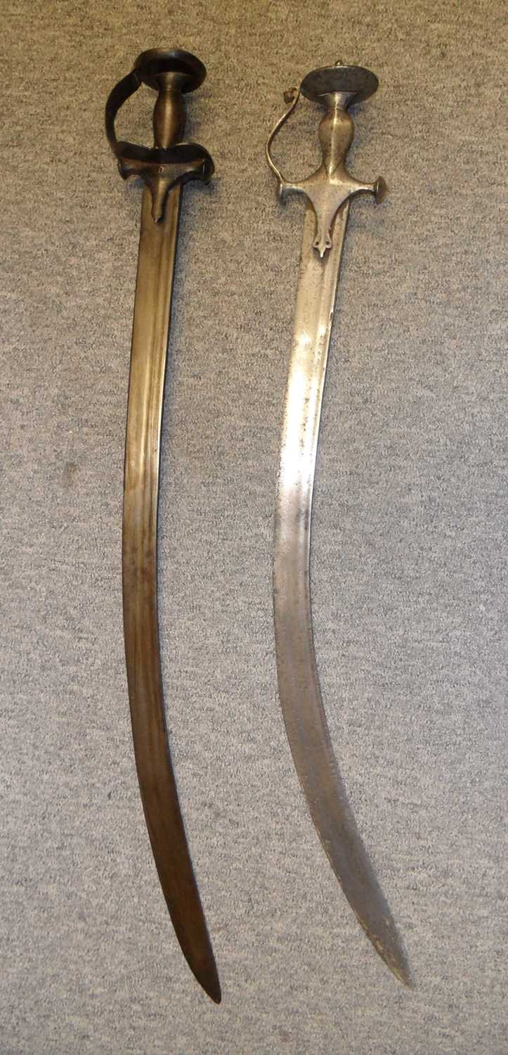 Lot 49 - TWO INDIAN SWORDS (TALWAR)