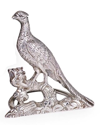 Lot 249 - A SET OF FOUR GEORGE V SILVER 'PHEASANT' CARD HOLDERS
