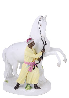 Lot 295 - A MEISSEN GROUP OF A REARING STALLION AND MOORISH GROOM