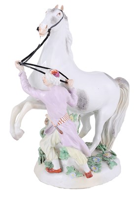 Lot 296 - A MEISSEN GROUP OF A REARING STALLION AND MOORISH GROOM