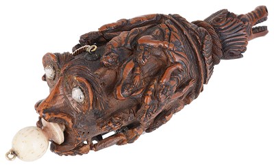 Lot 333 - A CARVED COQUILLA NUT FLASK