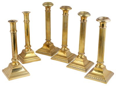 Lot 337 - A SET OF FOUR VICTORIAN BRASS CANDLESTICKS