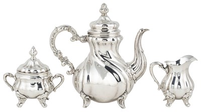 Lot 387 - A GERMAN THREE-PIECE TEA SET AND A DISH