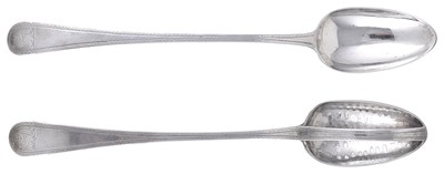 Lot 430 - A GEORGE III SILVER STRAINER SPOON AND A GRAVY SPOON