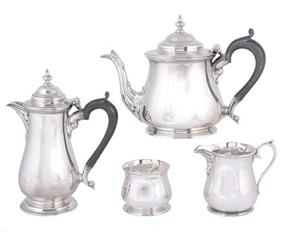 Lot 443 - A GEORGE V SILVER FOUR-PIECE 'TETE-A-TETE' TEA SET
