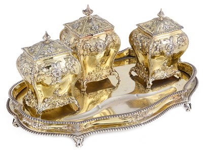 Lot 488 - A SET OF THREE GEORGE III SILVER-GILT TEA CADDIES LATER MOUNTED AS AN INKSTAND