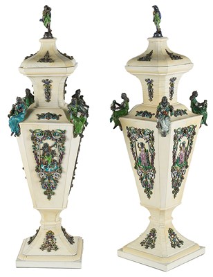 Lot 533 - ËœA PAIR OF AUSTRO-HUNGARIAN IVORY VASES AND COVERS WITH ENAMELLED SILVER MOUNTS
