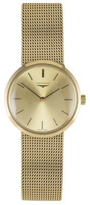 Lot 570 - LONGINES: A GENTLEMAN'S GOLD BRACELET WATCH