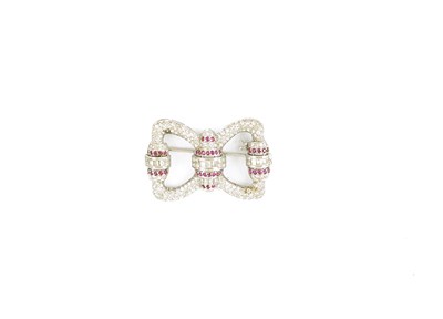 Lot 578 - DIAMOND AND RUBY BOW BROOCH