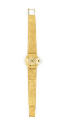 Lot 581 - PATEK PHILIPPE: EIGHTEEN CARAT GOLD LADY'S BRACELET WATCH