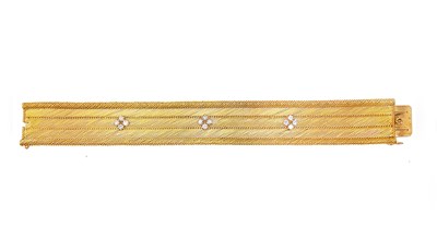 Lot 587 - GOLD AND DIAMOND BRACELET