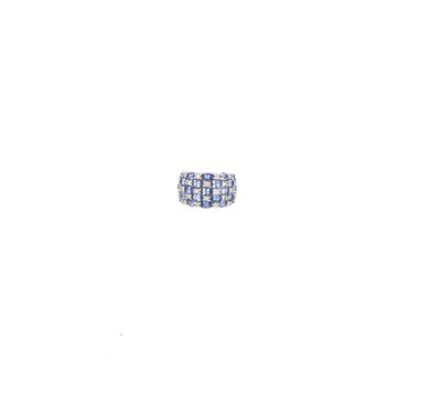 Lot 596 - TANZANITE AND DIAMOND DRESS RING
