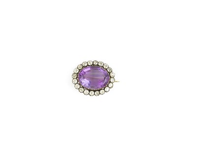 Lot 616 - AMETHYST AND DIAMOND BROOCH