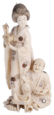 Lot 99 - ~A JAPANESE INLAID IVORY OKIMONO OF A GEISHA AND HER CLIENT