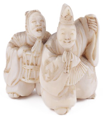 Lot 117 - ~IVORY NETSUKE OF TWO DANCERS