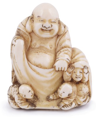 Lot 129 - ~IVORY NETSUKE OF THE LUCKY GOD HOTEI WITH CHILDREN
